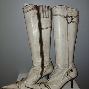 Chic Distressed Cream Heeled Boots with Heart Detail
